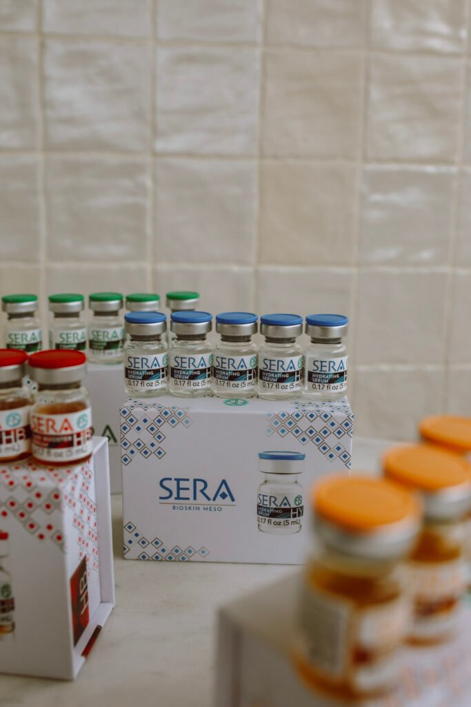 Boxes and small vials of SERA mesotherapy serums in several colors